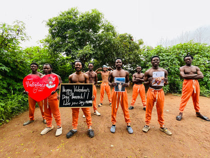 African Orange Pants Team